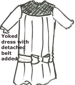 antique doll dressed yoked with belt